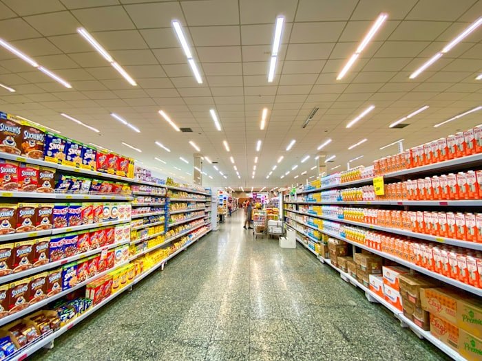 Warehouse aisle. The downstream effect of every forecast miss.